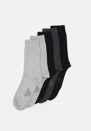 Five pairs of socks in various shades: light gray with stripes, medium gray with dots, dark gray, and black, showcasing smooth texture.
