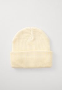 Berretto a maglia giallo con una texture a costine e un risvolto. Materiale morbido e caldo, adatto per il freddo.