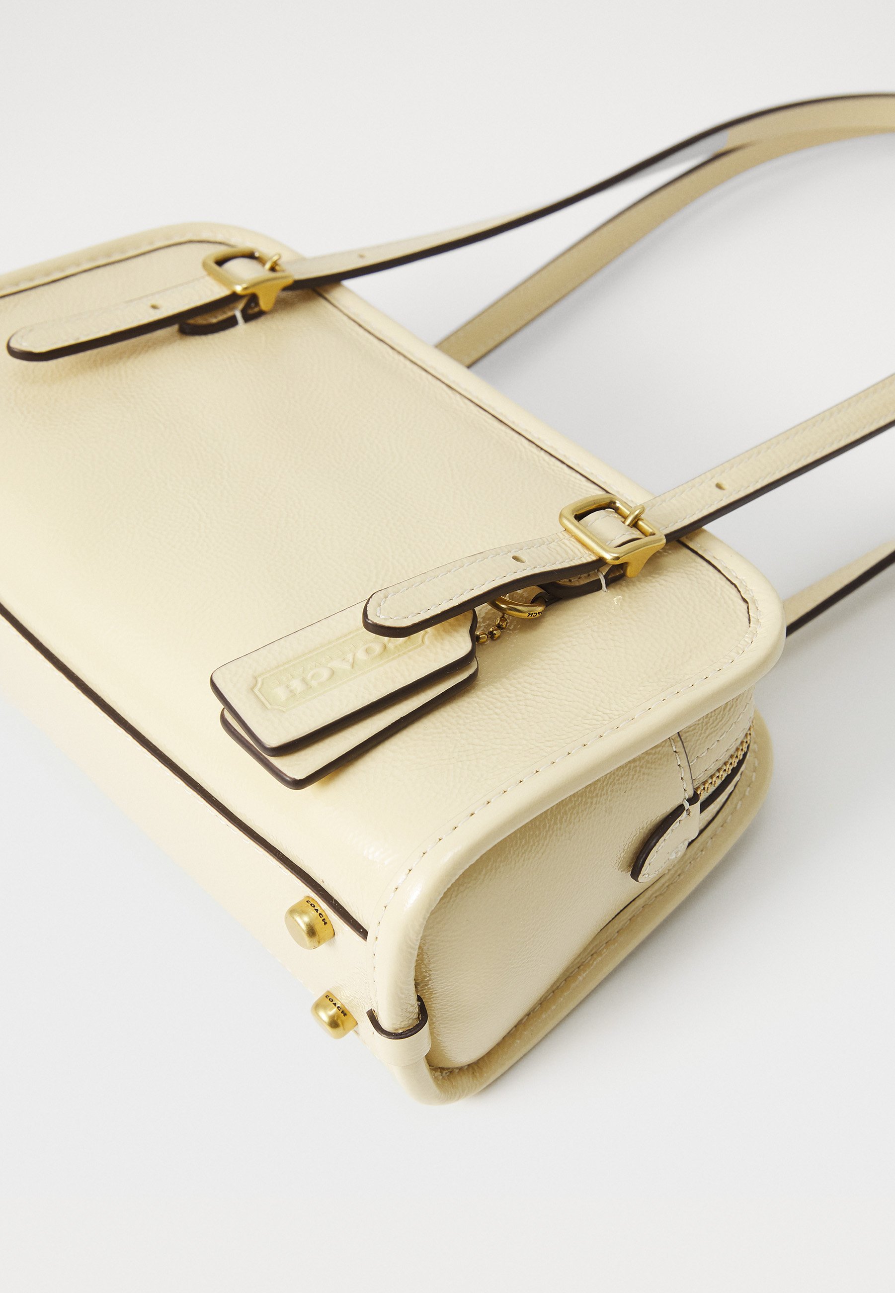 COACH SWING ZIP BAG 20 - Handbag - moonlight/light yellow