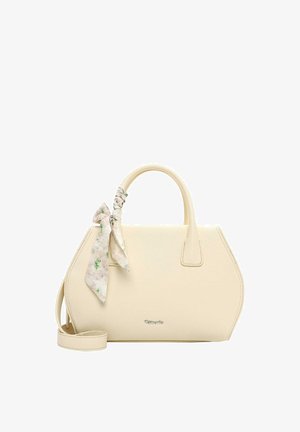 Bolso estructurado de color crema con asas superiores, una correa de hombro desmontable y un lazo de tela floral atado a una de las asas.