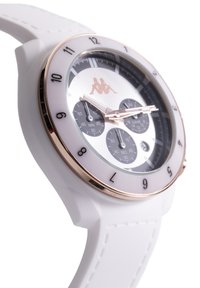 Orologio rotondo bianco con lunetta in oro rosa, quadranti neri e cinturino in silicone bianco; presenta numeri arabi e un logo al centro.