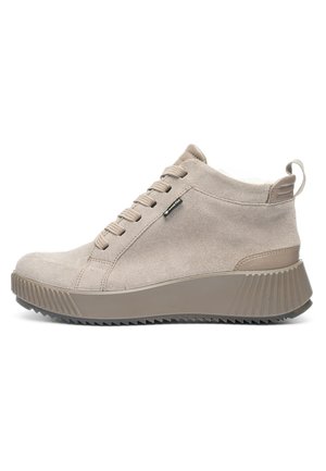 Beige suede high-top sneaker with lace-up front, thick ridged sole, and pull tab at heel, featuring small Gore-Tex label on side.