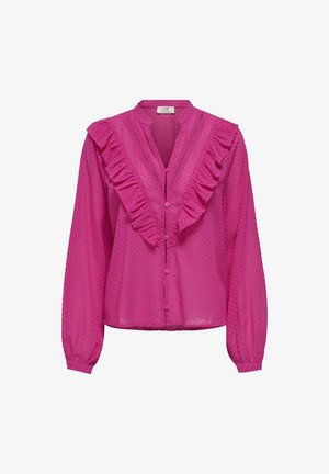 Blusa fucsia con maniche lunghe, davanti arricciato, texture a pois e chiusura con bottoni. Caratterizzata da un colletto alla mandarino e polsini elasticizzati.