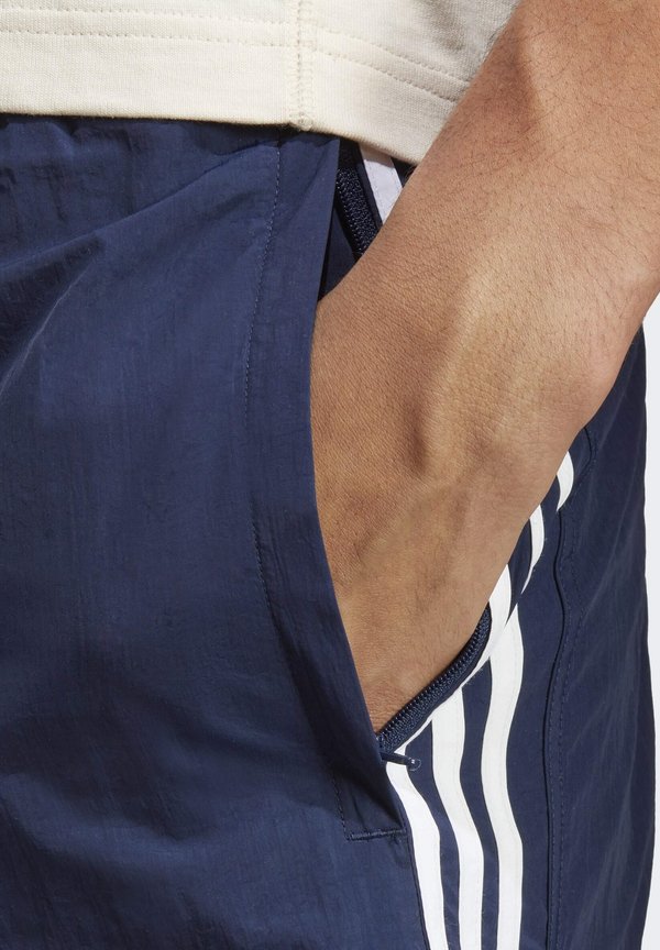 SPRINTER - Tracksuit bottoms - night indigo3