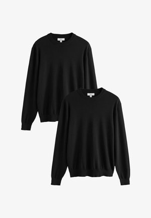 Zwei schlichte schwarze Rundhalspullover mit langen Ärmeln und gerippten Bündchen und Säumen, vor weißem Hintergrund gezeigt.