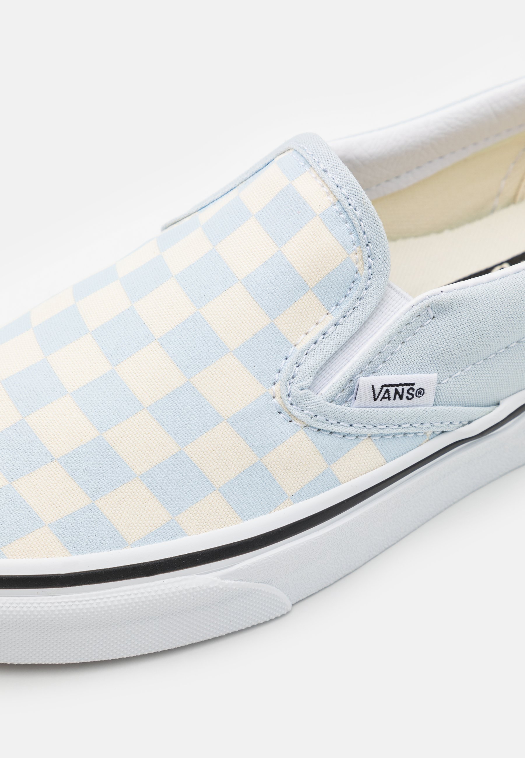 white slip on vans amazon