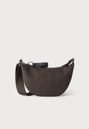 Dark brown crescent-shaped shoulder bag with wide strap and black leather zipper pull on a plain white background.
