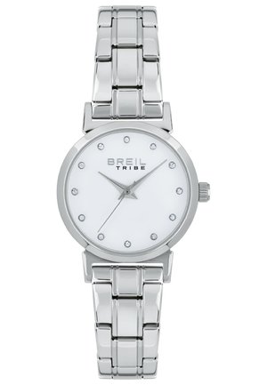 Sølv rustfrit stål ur med en rund hvid urskive, prydet med time markører, og et kædearmbånd. Har sweep-visere og logo.