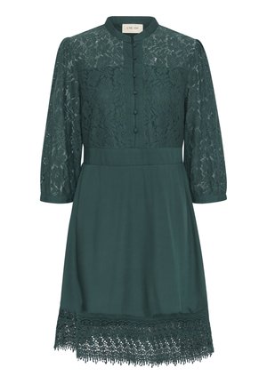 Abito teal con corpino in pizzo, maniche a tre quarti e chiusura a bottoni. L'orlo presenta un bordo in pizzo a soffietto per un tocco di eleganza.