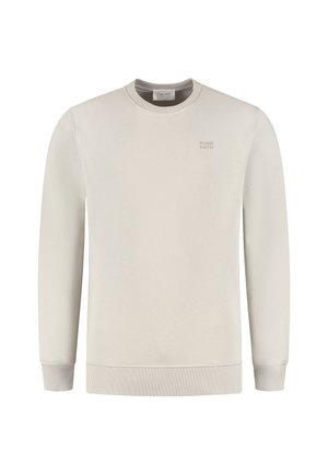 Hellbeige Crewneck-Sweatshirt aus weichem Stoff, mit gerippten Bündchen und Saum, sowie einem kleinen, prägierten Logo auf der Brust.