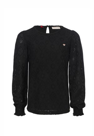 Zwarte blouse met lange mouwen van een getextureerde kantstof met ruitpatronen, een ronde halslijn en een kleine hartaccessoire op de borst.