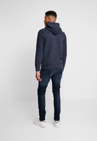 Jack & Jones JJITIM JJORIGINAL JOS - Slim fit jeans - blue denim - Zalando.co.uk