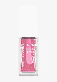 Genomskinlig rektangulär flaska med ett vitt lock, innehållande rosa lip oil med små bubblor. Etiketten har texten "lip oil" och "7 oils" i vit text.