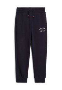 Marineblaue Jogginghosen mit gerippten Bündchen und Taillenbund, Kordelzug mit roten und weißen Enden sowie weißem Logo-Text "Hilfiger Est 1985 New York" am linken Oberschenkel.
