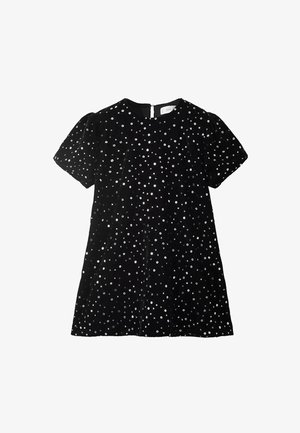 Abito in velluto nero con maniche a sbuffo corte, caratterizzato da paillettes circolari argentate sparse. Chiusura con zip sul retro, silhouette a trapezio, texture liscia.