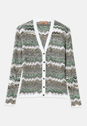 Patterned cardigan featuring zigzag waves in green, black, and brown hues. It has a white trim and button closure. Soft knit texture.