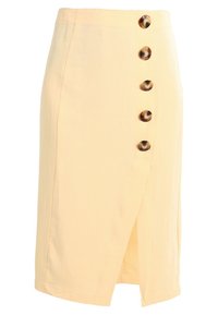 Žlutá bavlněná tužková sukně s předním rozparkem a pěti hnědými kulatými knoflíky podél strany. Hladká textura a přiléhavý střih.