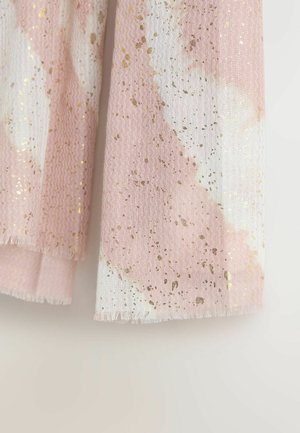 Heledad roosa ja valge mustriga kangas, millel on laineline tekstuur, kuldsed täpid ja frantsiisjäsemed.