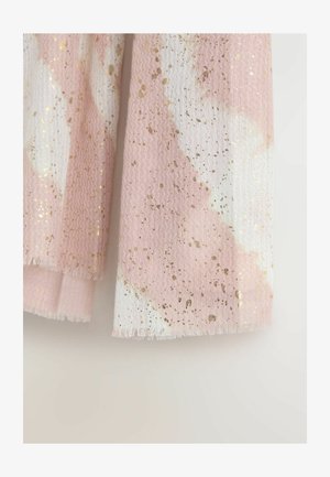 Heledad roosa ja valge mustriga kangas, millel on laineline tekstuur, kuldsed täpid ja frantsiisjäsemed.