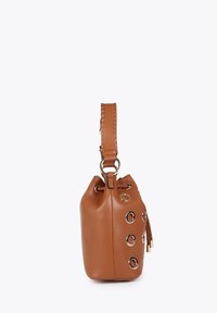 Brown leather drawstring bag with metallic eyelets, braided handle, side tassel detail, smooth texture, and gold-tone hardware accents.