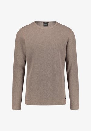 Pitkähihainen paita vaaleanruskeassa värissä, valmistettu teksturoidusta kankaasta, jossa on pyöreä pääntie ja hienovaraiset ompelut yksityiskohdat helmassa ja hihoissa.