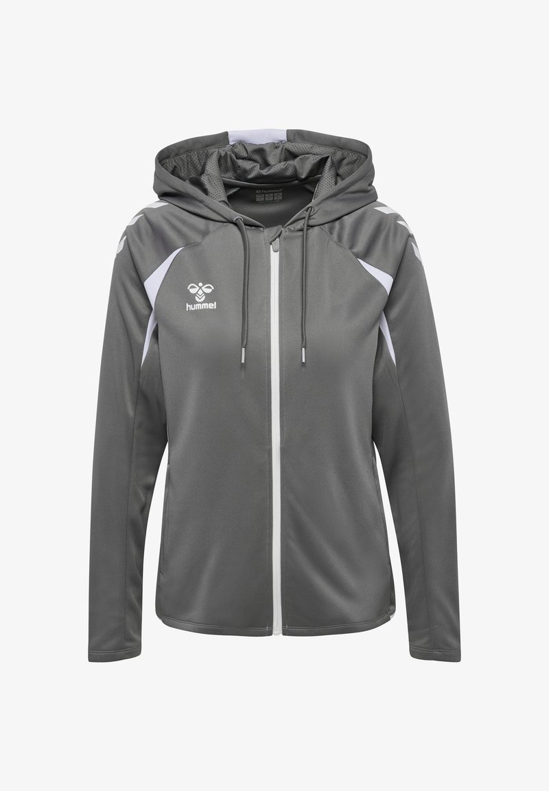 Sweat à capuche zippé gris Hummel avec accents blancs, cordons de serrage et logo sur la poitrine gauche, conçu pour une tenue sportive.