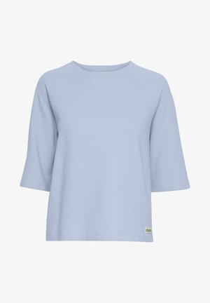 Hele sinine vabalt langev pullover, millel on ümmargune kaelus ja 3/4 raglanvarrukad, ribakujuline tekstuur ja väike logo hemil.