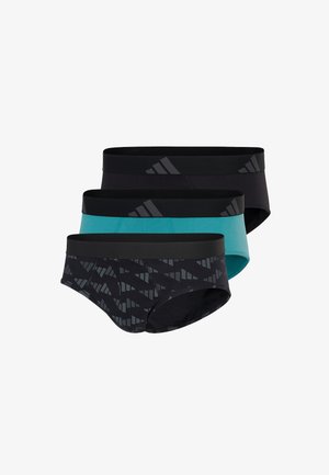 Trzy pary męskich bokserek: jedna czarna z geometrycznym wzorem, jedna w jednolitym kolorze teal oraz kolejna w jednolitym kolorze czarnym, wszystkie z kontrastującymi czarnymi gumkami w pasie.
