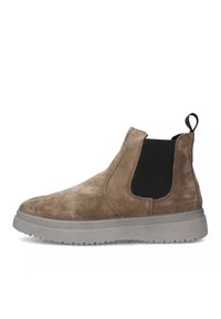 Stivali alla caviglia in suede marrone con pannelli laterali elasticizzati, un tassello per la presa e una suola in gomma grigia dotata di un motivo di trazione per la presa.