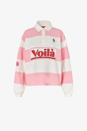 Hosszú ujjú rögbi felső széles, vízszintes rózsaszín és fehér csíkokkal, fehér gallérral, elöl nagy piros betűkkel "Voilà" felirattal.