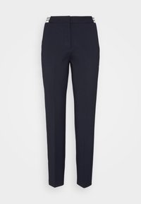 Námořnické kalhoty z hladkého materiálu, s rovnými nohavicemi a dvěma bílými pruhy na pase.