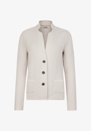Lys beige cardigan lavet af struktureret stof, med en ståkrave, tre mørke knapper og to forlommer.