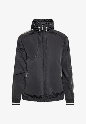 Zwarte windjack met capuchon, elastische manchetten en een ritssluiting aan de voorkant. Voorzien van gestreepte accenten en zijzakken. Soepele, lichte stof.