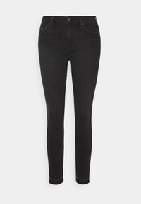 Černé džíny skinny s přiléhavým střihem, pěti kapsami a upraveným lemem na kotnících. Vyrobeno z elastické bavlny.
