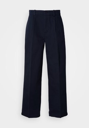 Navy blue wide-leg trousers made from cotton, featuring a button closure, front crease detail, and a smooth textile surface.