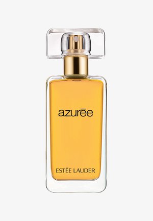 Heldere glazen parfumfles met een rechthoekige vorm, gouden vloeistof en een spraydop met gouden accents. Etiket leest "azurēe" en "ESTÉE LAUDER."