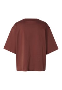 T-shirt marron oversize uni à manches courtes vu de dos, avec un col rond et une coupe ample.