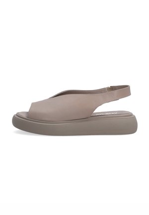 Beige slingback sandal featuring a smooth leather upper, round open toe, and a contoured platform sole for comfort and stability.