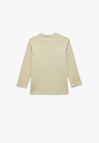 Pitkähiha beige paita, joka on valmistettu teksturoidusta kankaasta. Siinä on pyöreä kaula-aukko ja rento malli. Ei näkyviä logoja tai koristeita.