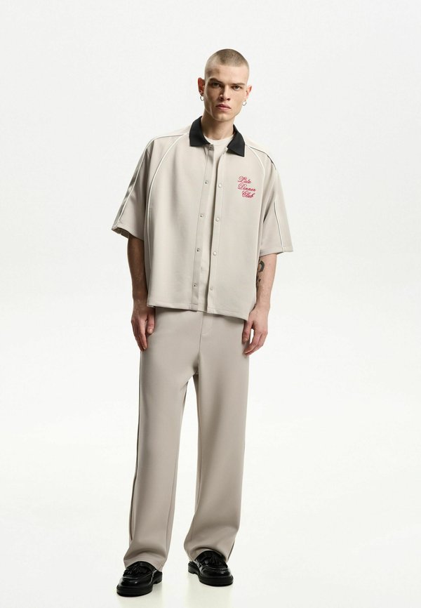 JOGGER-BAGGY - Jogginghose