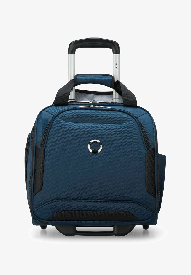 Valise à roulettes Delsey en tissu bleu foncé avec des accents noirs, dotée d'une poignée télescopique, de deux poignées de maintien en haut et de roulettes lisses.