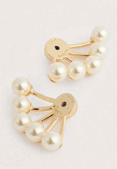 Χρυσές hair clips με πέντε ψεύτικες μαργαρίτες διατεταγμένες σε σχήμα φτερού και με κομψό μεταλλικό σχέδιο, που παρουσιάζουν γυαλιστερή φινίρισμα.