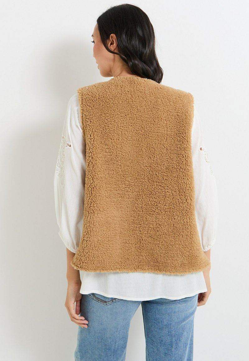 SYDUZAX Gilet En Fausse Fourrure Femme Manteau Sans Manches Chaud Outerwear Décontractée Cardigan Femme Ample Mode Automne Hiver Pour Femmes Veste Chaud Grande Taille Laine Vestes Élégant Casual