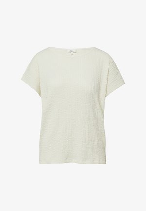 Kurzärmlige, cremefarbene Bluse mit strukturierter Oberfläche, rundem Ausschnitt, lässiger Passform und kleinem Stoffetikett am Kragen.