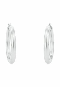 Pendientes de aro de plata con una textura suave y pulida y un diseño ligeramente curvado. Cuentan con un cierre simple para un uso seguro.