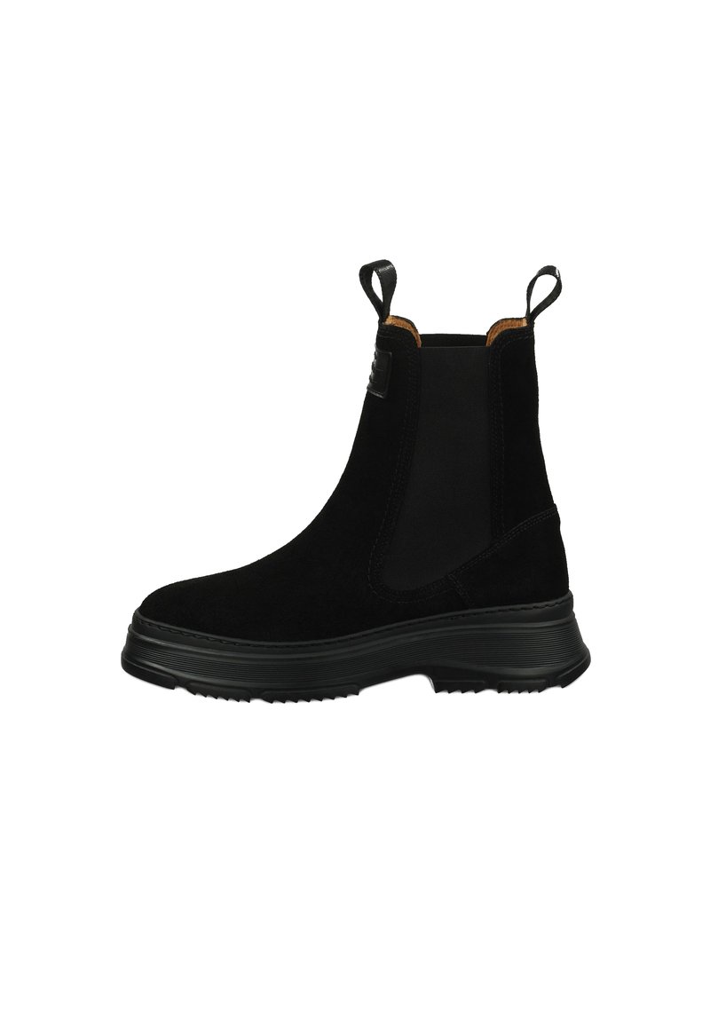 Botines de ante negros con paneles elásticos en los laterales, lengüetas de tirón, suela de goma texturizada y punta redonda. Forro suave con acentos en contraste.