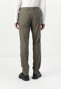 Olive green trousers with a tailored fit, featuring two back pockets and a straight leg design. Durable fabric with a smooth texture.
