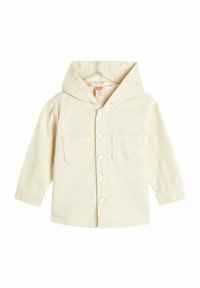 Lys beige hættetrøje med knapper foran, to brystlommer og lange ærmer. Designet i et blødt, åndbart materiale med en afslappet pasform.