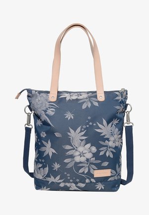 Torba tote w kwiatowy wzór w ciemnoniebieskim kolorze, z jasnobeżowymi skórzanymi uchwytami, zamkiem błyskawicznym i regulowanym paskiem na ramię.
