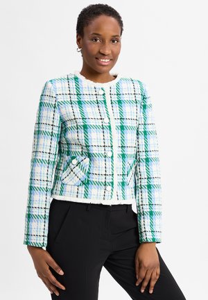 Tweed jasje met een groen, blauw en zwart geruite patroon. Kenmerken zijn een ronde halslijn, vijf knopen aan de voorkant en twee zakken aan de voorkant.